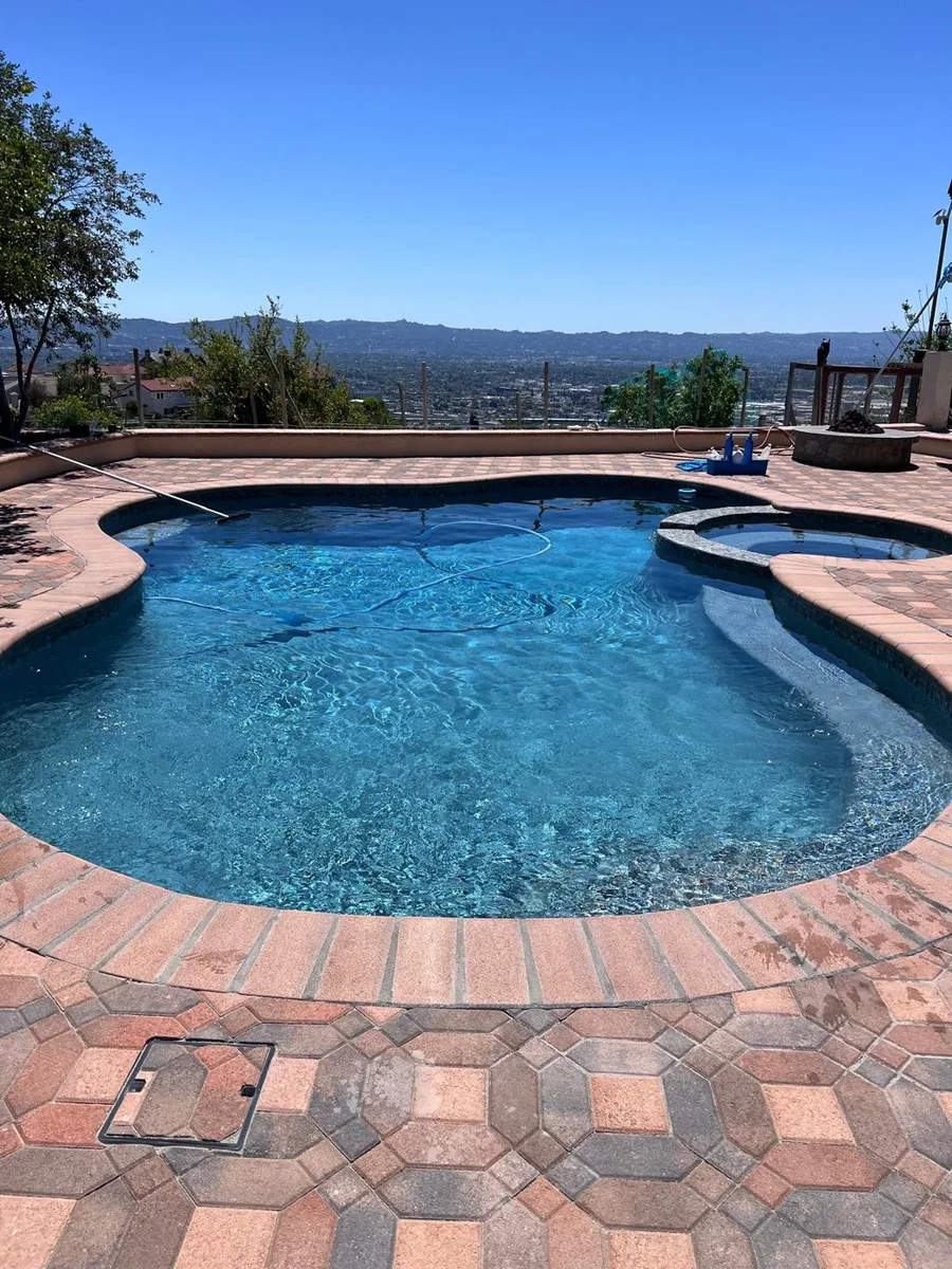 Pool surrounded by brick pavers