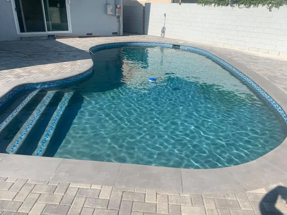 Kidney-shaped pool with clear water